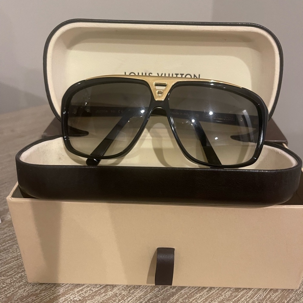Louis Vuitton Evidence Sunglasses. Black and gold. Case included with purchase.